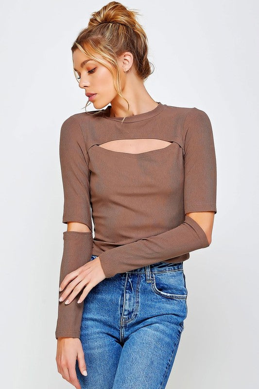 RIBBED FITTED LONG SLEEVE TOP WITH CHEST CUTOUT AN-Round neck cutout chest and slit sleeves fitted top-Ribbed material- Model in taupe is 5' 8" 32-23-34 and wearing a small
Style: casual
Print / Pattern: solid rib
S