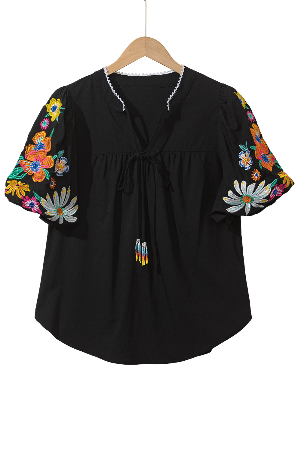 Mineral Red Floral Embroidered Puff Sleeve Split Neck BlouseMaterial:100%Cotton

• Radiate bohemian charm with the Mineral Red blouse featuring intricate floral embroidery and puff sleeves, perfect for a free-spirited look.
