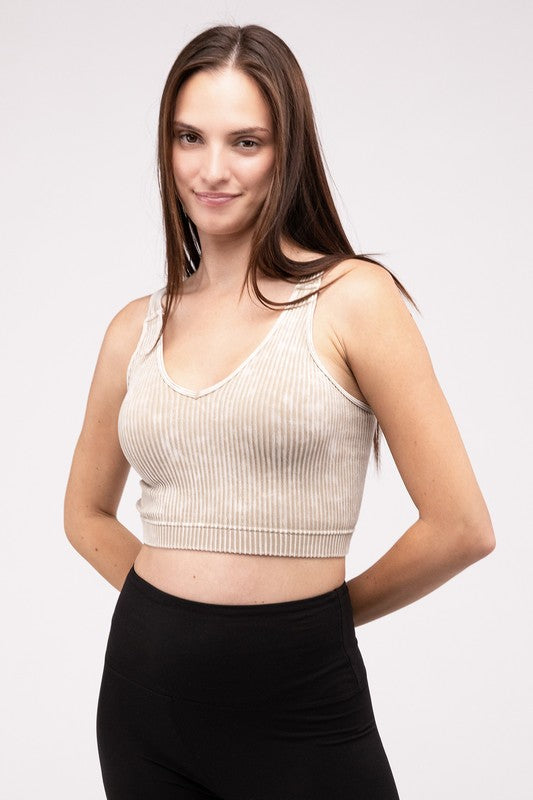 Washed Ribbed Cropped V-Neck Tank TopThe Washed Ribbed Cropped V-Neck Tank Top offers a stylish and comfortable option for your wardrobe. Made from ribbed fabric with a washed finish, it exudes a casual