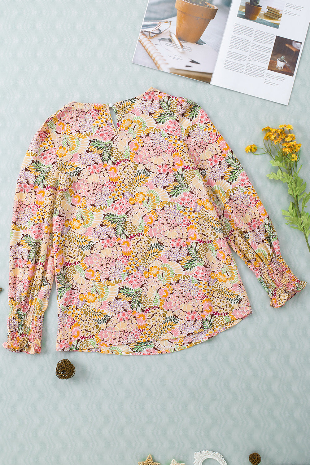 Multicolor Floral Print Smocked Cuffs Long Sleeve BlouseMaterial:100%Polyester


	

			The Floral Print Smocked Cuffs Long Sleeve Blouse is a feminine and elegant addition to any wardrobe. Its delicate floral print and