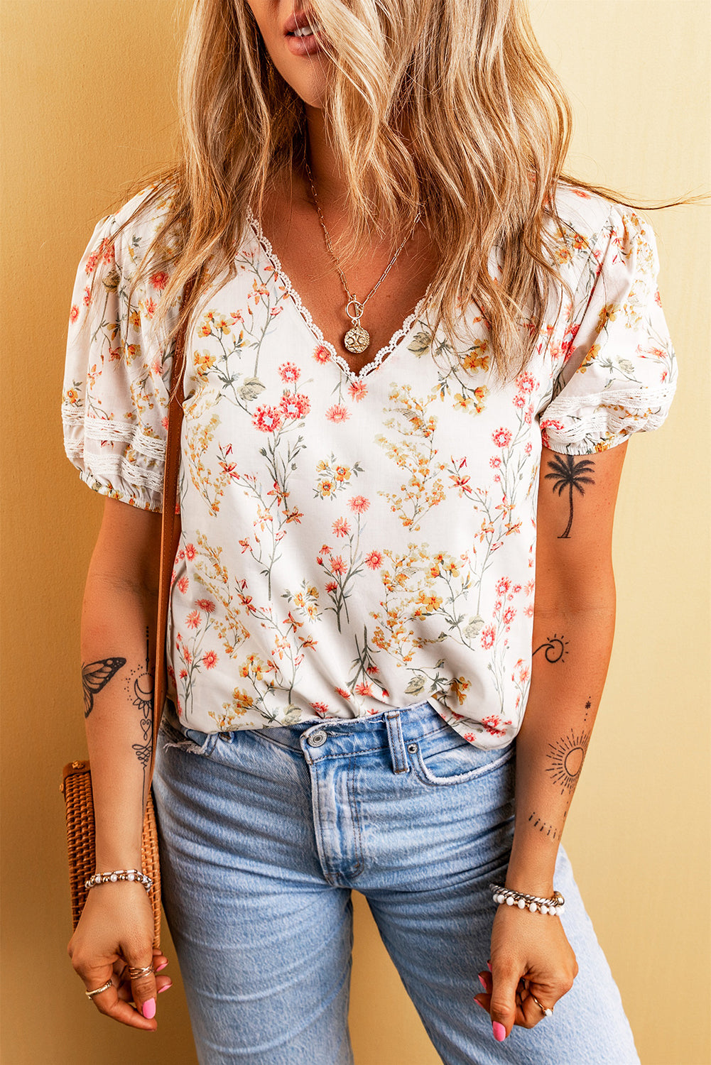 Beige Boho Floral Lace Trim Short Sleeve BlouseMaterial:100%Polyester

• Embrace bohemian chic with this blouse, featuring intricate lace details that add a touch of elegance to your look.
• The V-neck design o