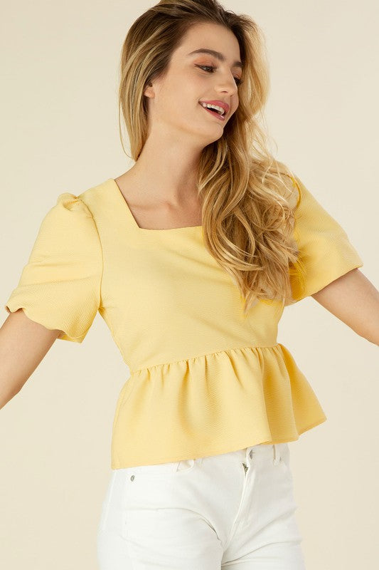 Bubbles sleeved blouse with peplum- Bubbles sleeved blouse with peplum, back tie for closing- Pattern type : solid- Neck line : square neck- Sleeve type : bubble sleeves- Sleeve length : short sleeve