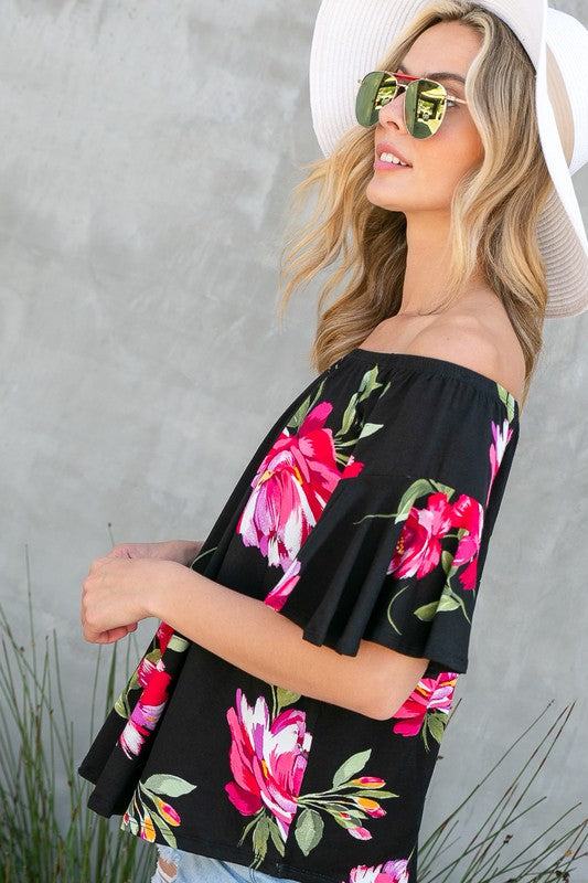 FLORAL OFF SHOULDER TOPFLORAL PRINT JERSEY ELASTICIZED OFF SHOULDER TOP- Floral off shoulder top- Elasticized off shoulder neckline- Ruffle short sleeves- Loose fit- Allover floral print j