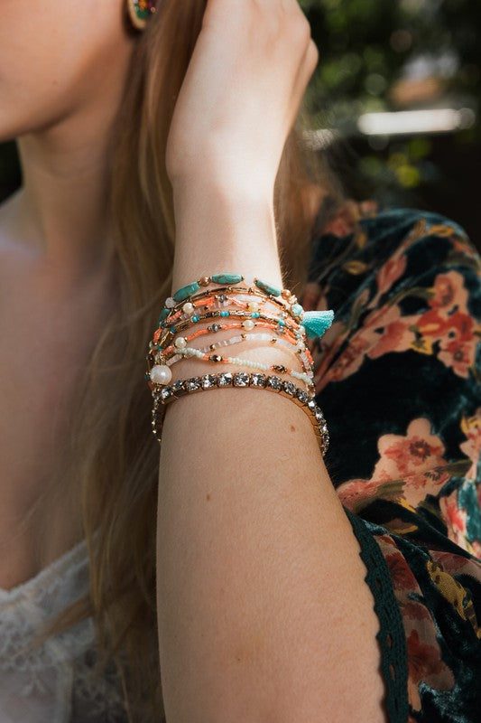 Sweet Pastel Studded Beads Layered Bracelet25% Glass 30% Clay 10% Pearl 10% CCB 10% Brass 10% Iron 5% PolyesterImmediate ShippingHandcrafted in IndiaMaterial Composition: 25% Glass 30% Clay 10% Pearl 10% CCB 