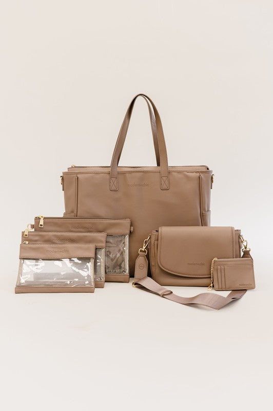 SIGNATURE TOTE CARRY ALL ON LAPTOP BAGSimplify life on the go with a modern+chic exclusive: The Signature Tote. Chic, versatile, and functional, we designed this vegan leather tote with your busy lifesty