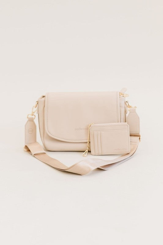 SIGNATURE CROSSBODY SHOULDER BAG WITH CARD WALLETSleek, durable vegan leather material? Check. A matching wallet? Check. Goes-with-everything colors and a chic silhouette? Double check!The Signature Crossbody is fu