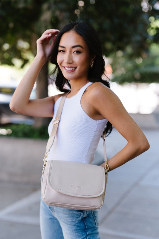 SIGNATURE CROSSBODY SHOULDER BAG WITH CARD WALLETSleek, durable vegan leather material? Check. A matching wallet? Check. Goes-with-everything colors and a chic silhouette? Double check!The Signature Crossbody is fu