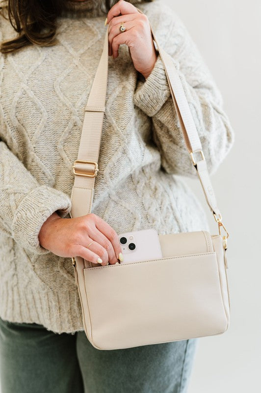 SIGNATURE CROSSBODY SHOULDER BAG WITH CARD WALLETSleek, durable vegan leather material? Check. A matching wallet? Check. Goes-with-everything colors and a chic silhouette? Double check!The Signature Crossbody is fu