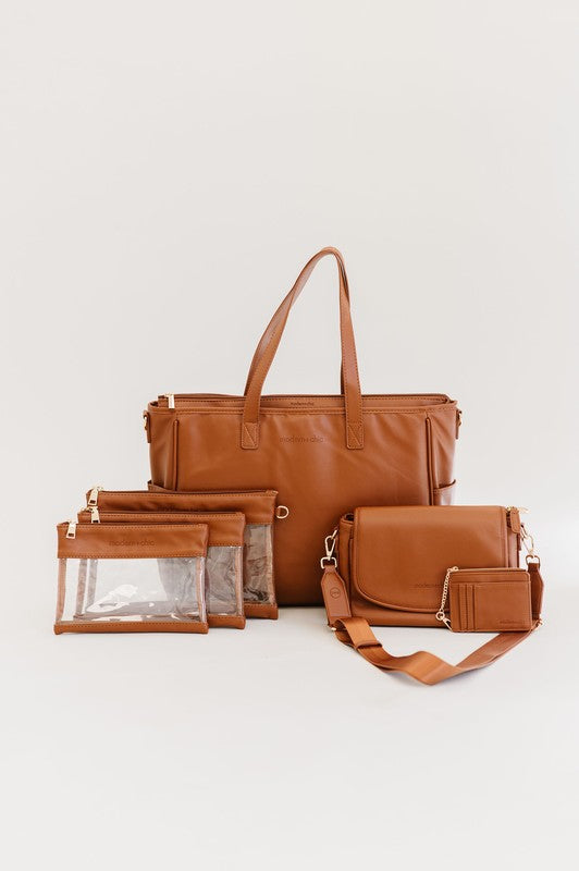 SIGNATURE CROSSBODY SHOULDER BAG WITH CARD WALLETSleek, durable vegan leather material? Check. A matching wallet? Check. Goes-with-everything colors and a chic silhouette? Double check!The Signature Crossbody is fu