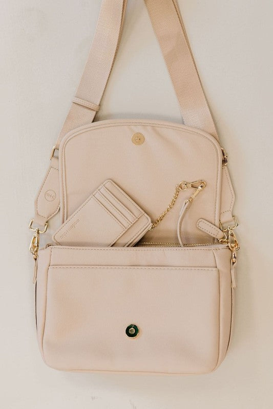 SIGNATURE CROSSBODY SHOULDER BAG WITH CARD WALLETSleek, durable vegan leather material? Check. A matching wallet? Check. Goes-with-everything colors and a chic silhouette? Double check!The Signature Crossbody is fu