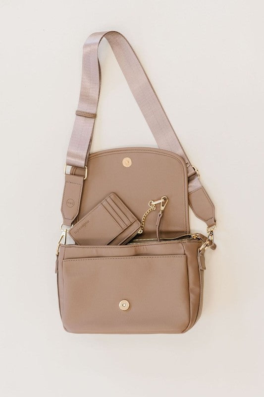 SIGNATURE CROSSBODY SHOULDER BAG WITH CARD WALLETSleek, durable vegan leather material? Check. A matching wallet? Check. Goes-with-everything colors and a chic silhouette? Double check!The Signature Crossbody is fu