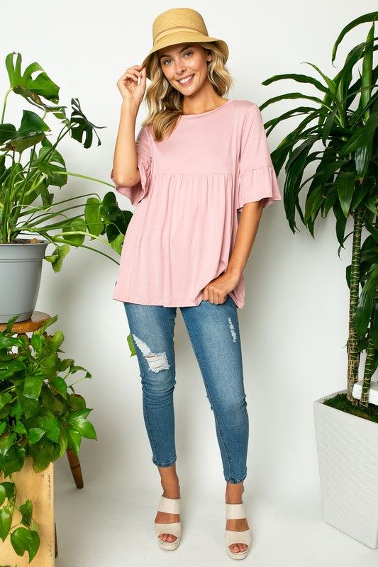 PLUS SOLID RUFFLE SLEEVE LOOSE TOPSOLID JERSEY ROUND NECK HALF RUFFLE SLEEVE LOOSE FIT PLUS TOP95% RAYON, 5% SPANDEX MADE IN USA1X/2X/3X 2-2-2
Style: Casual
Print / Pattern: SOLID
Fit: LOOSE FIT 
Nec