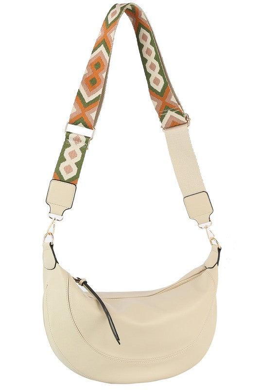 Aztec Guitar Strap Hobo Crossbody BagAztec Guitar Strap Hobo Crossbody Bag Faux vegan leather Zip top closure Gold-tone hardware Detachable shoulder strap L 15 * H 8 * W 2.5