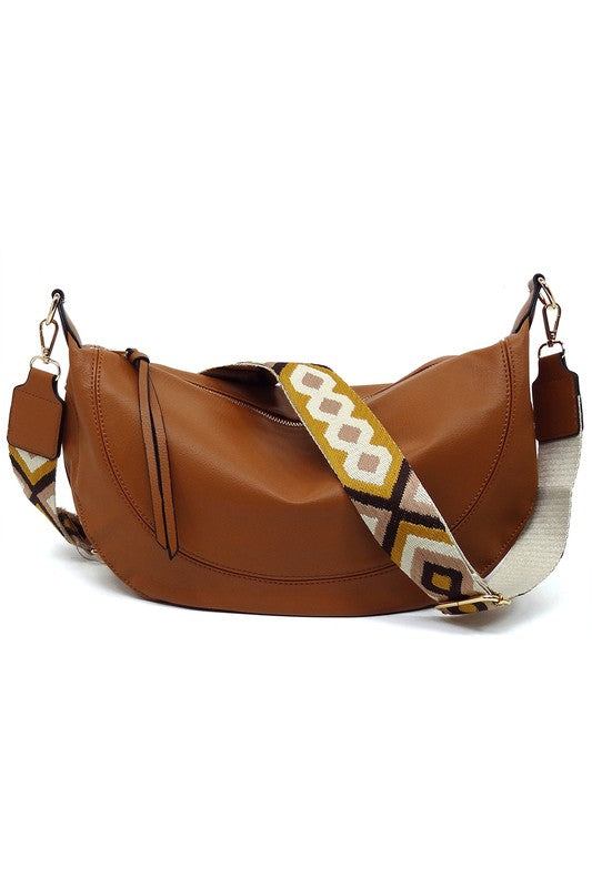 Aztec Guitar Strap Hobo Crossbody BagAztec Guitar Strap Hobo Crossbody Bag Faux vegan leather Zip top closure Gold-tone hardware Detachable shoulder strap L 15 * H 8 * W 2.5