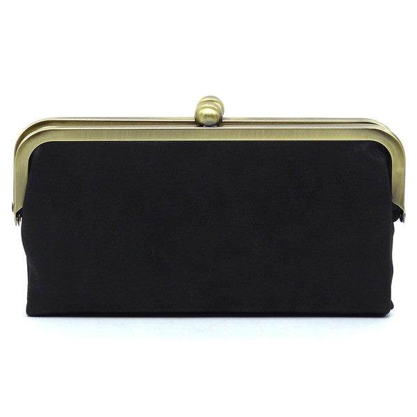 Fashion Kiss Lock Clutch WalletFashion Kiss Lock Clutch Wallet Faux vegan leather Two top frame compartments and is finished with a clasp closure. Lining features three card slots, a zip pocket an