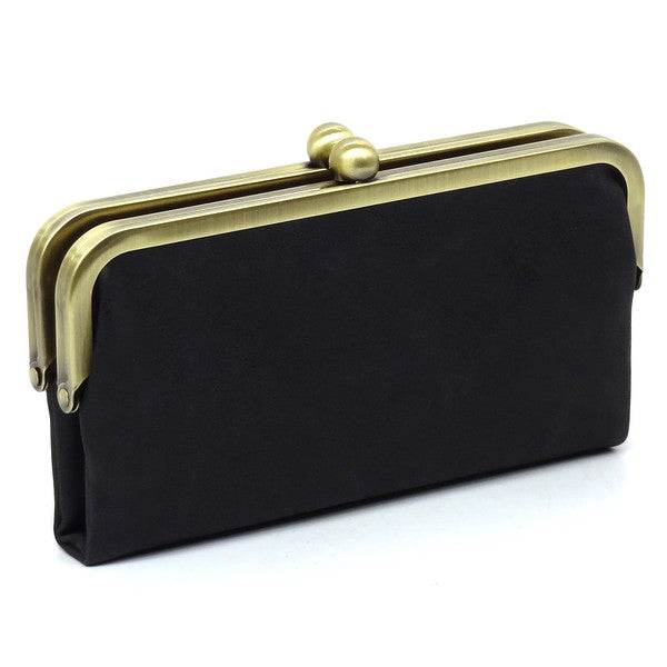 Fashion Kiss Lock Clutch WalletFashion Kiss Lock Clutch Wallet Faux vegan leather Two top frame compartments and is finished with a clasp closure. Lining features three card slots, a zip pocket an