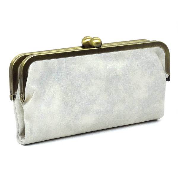 Fashion Kiss Lock Clutch WalletFashion Kiss Lock Clutch Wallet Faux vegan leather Two top frame compartments and is finished with a clasp closure. Lining features three card slots, a zip pocket an