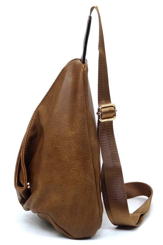 Fashion Sling Bag BackpackFashion Sling Bag Backpack Faux vegan leather Zip top closure Gold-tone hardware Adjustable shoulder strap L 7.5 * H 12 * W 4.5