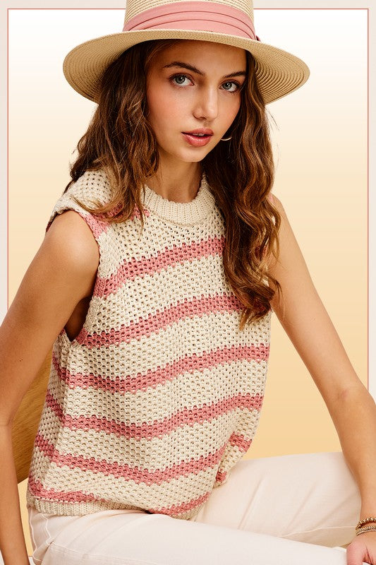 Chunky Stripe Sleeveless Sweater TopThis stripe pullover is featured in a chunky knit fabrication with relaxed fit. The true definition of an effortless essential, this staple pullover is the perfect p