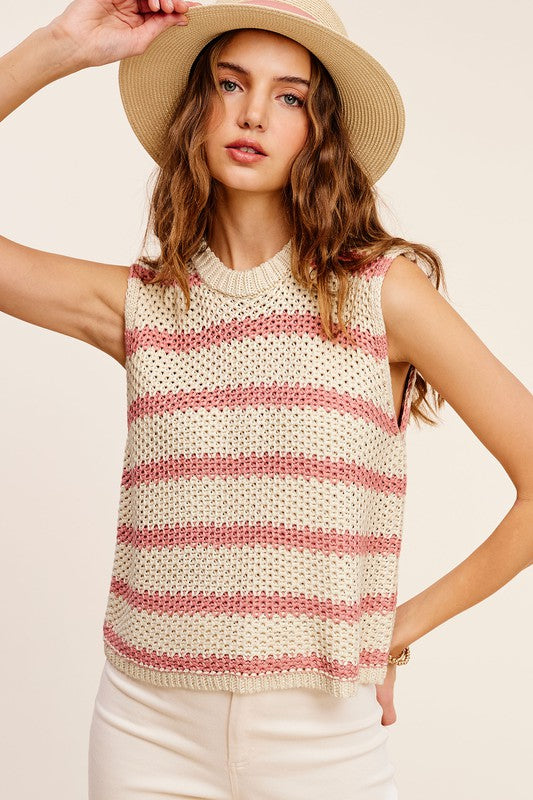 Chunky Stripe Sleeveless Sweater TopThis stripe pullover is featured in a chunky knit fabrication with relaxed fit. The true definition of an effortless essential, this staple pullover is the perfect p