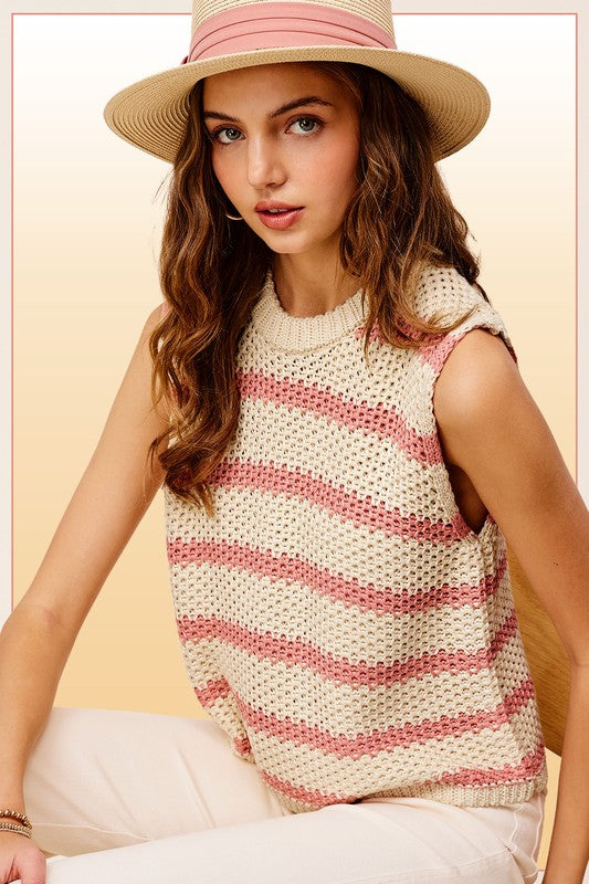 Chunky Stripe Sleeveless Sweater TopThis stripe pullover is featured in a chunky knit fabrication with relaxed fit. The true definition of an effortless essential, this staple pullover is the perfect p