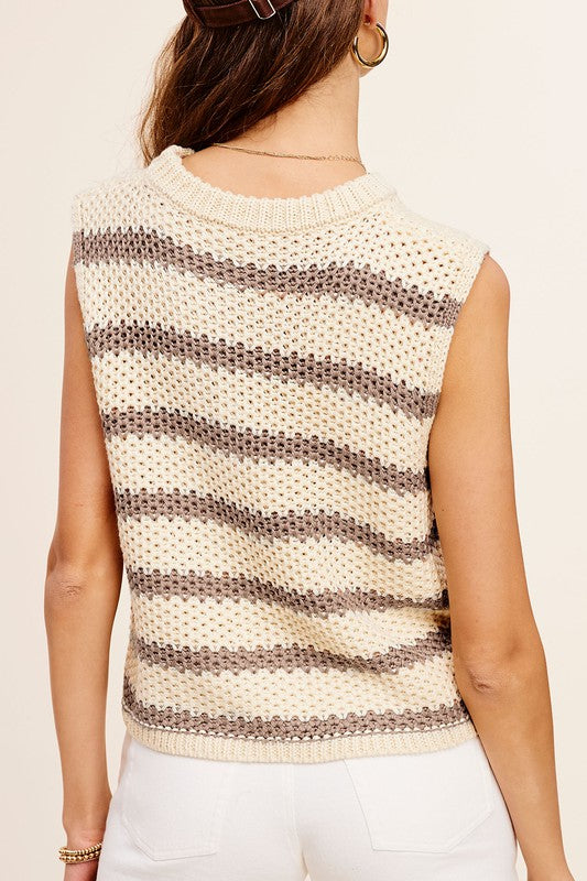 Chunky Stripe Sleeveless Sweater TopThis stripe pullover is featured in a chunky knit fabrication with relaxed fit. The true definition of an effortless essential, this staple pullover is the perfect p