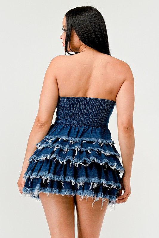 Denim Delight Tiered Ruffle DressIntroducing the "Denim Delight Tiered Ruffle Dress" - a playful and chic statement piece that combines the casual appeal of denim with the femininity of ruffles. Thi