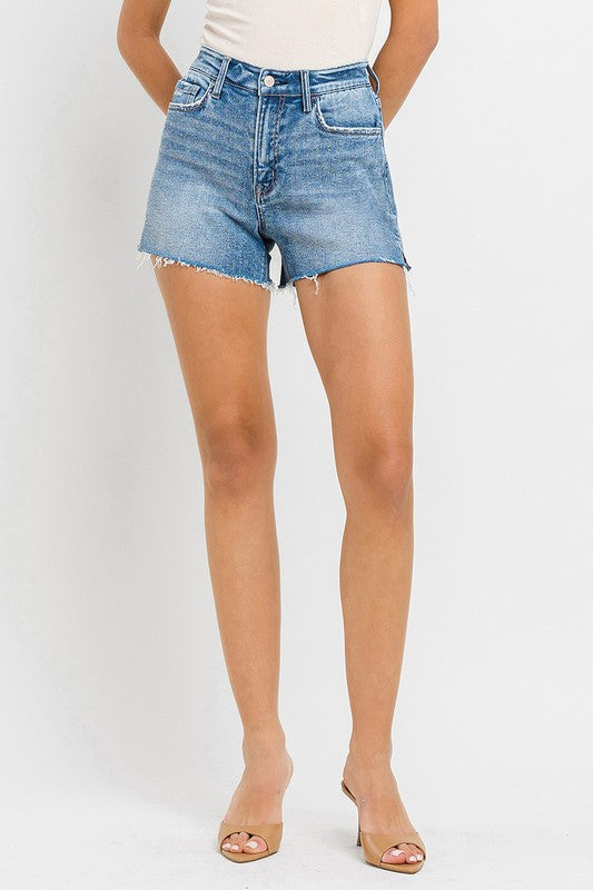 High Rise Side Slit A Line ShortsThe High Rise Side Slit A Line Shorts redefine casual chic. Crafted from comfortable stretch denim, these shorts feature a flattering high rise waist that elongates 