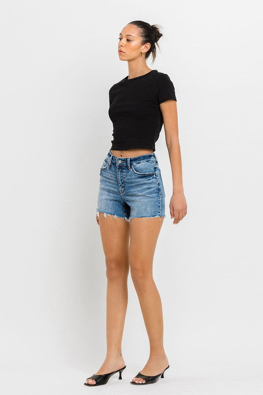 High Rise Raw Hem Denim ShortsIntroducing our High Rise Raw Hem Denim Shorts, crafted from comfortable stretch denim for a flattering fit and lasting comfort. Designed with a high-rise waist, the