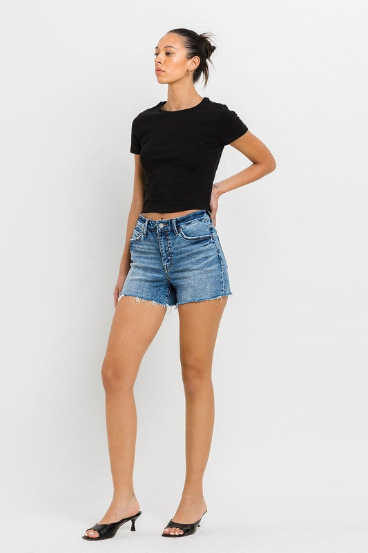 High Rise Raw Hem Denim ShortsIntroducing our High Rise Raw Hem Denim Shorts, crafted from comfortable stretch denim for a flattering fit and lasting comfort. Designed with a high-rise waist, the