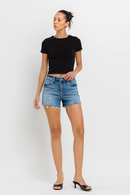 High Rise Raw Hem Denim ShortsIntroducing our High Rise Raw Hem Denim Shorts, crafted from comfortable stretch denim for a flattering fit and lasting comfort. Designed with a high-rise waist, the