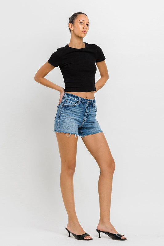 High Rise Raw Hem Denim ShortsIntroducing our High Rise Raw Hem Denim Shorts, crafted from comfortable stretch denim for a flattering fit and lasting comfort. Designed with a high-rise waist, the