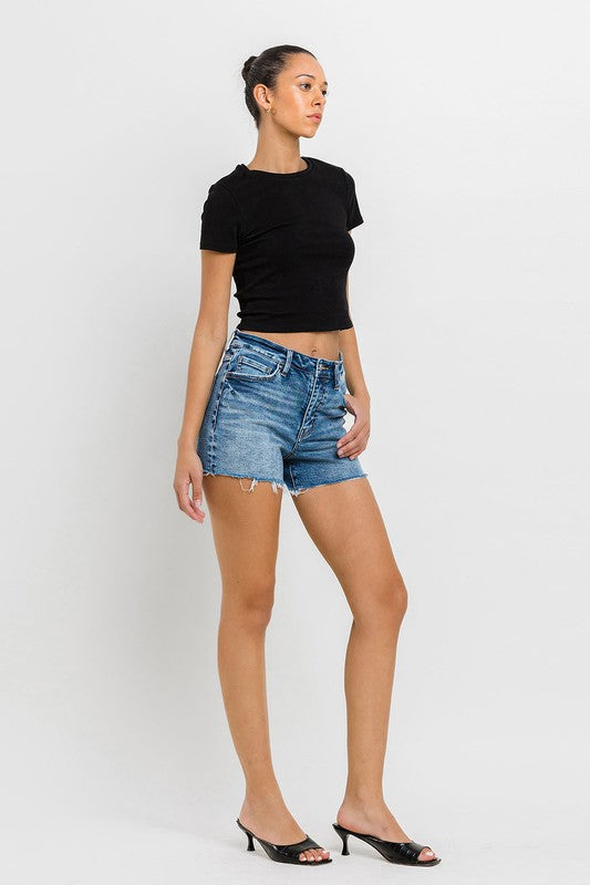 High Rise Raw Hem Denim ShortsIntroducing our High Rise Raw Hem Denim Shorts, crafted from comfortable stretch denim for a flattering fit and lasting comfort. Designed with a high-rise waist, the