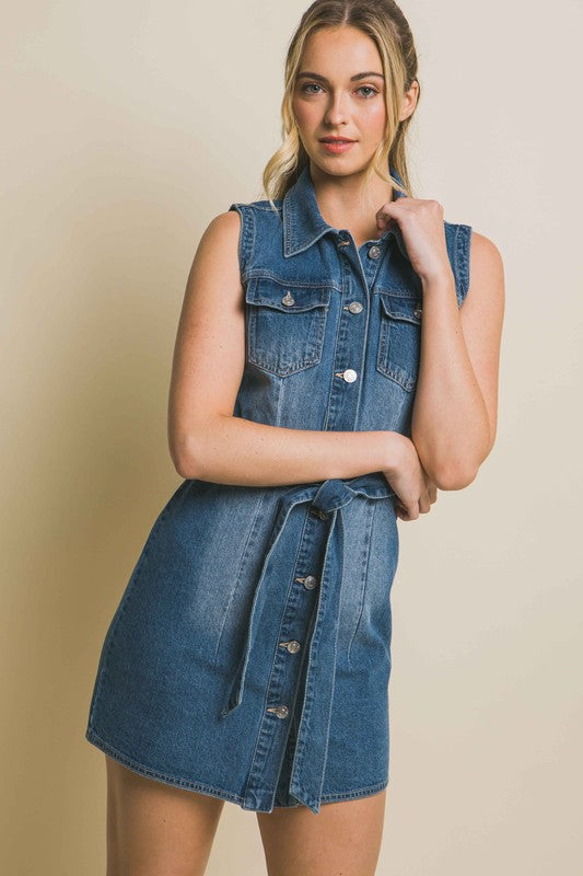 Denim Strapless Dress with Waist TieThe Denim Strapless Dress with Waist Tie offers a chic and versatile option for your wardrobe. Crafted from durable denim fabric, this dress features a strapless nec