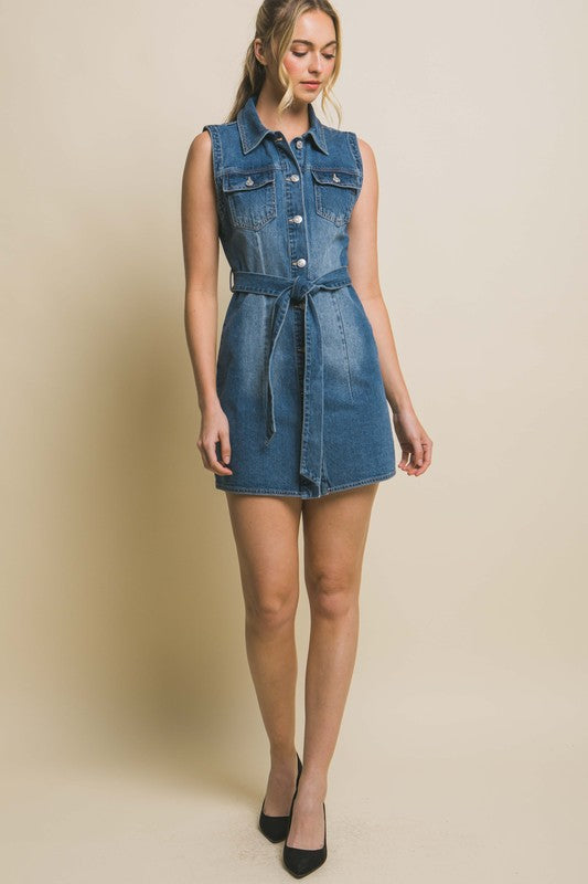 Denim Strapless Dress with Waist TieThe Denim Strapless Dress with Waist Tie offers a chic and versatile option for your wardrobe. Crafted from durable denim fabric, this dress features a strapless nec