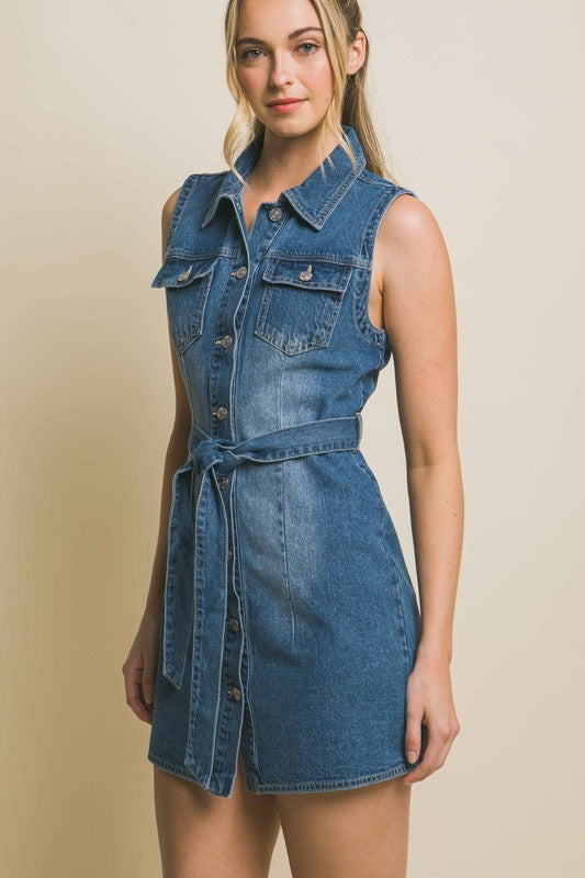 Denim Strapless Dress with Waist TieThe Denim Strapless Dress with Waist Tie offers a chic and versatile option for your wardrobe. Crafted from durable denim fabric, this dress features a strapless nec