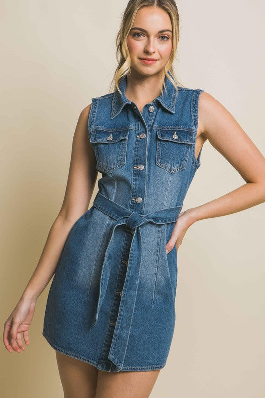 Denim Strapless Dress with Waist TieThe Denim Strapless Dress with Waist Tie offers a chic and versatile option for your wardrobe. Crafted from durable denim fabric, this dress features a strapless nec