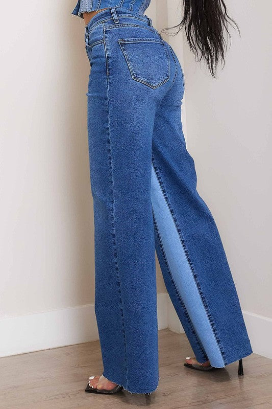 High-Rise Color Block Wide JeansIntroducing our High-Rise Color Block Wide Jeans, a bold and stylish addition to your denim collection. Crafted from stretch denim, these jeans offer both comfort an