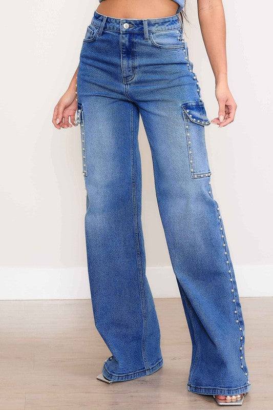 Pearl High-Rise Wide Leg Cargo JeansElevate your denim collection with our Pearl High-Rise Wide Leg Cargo Jeans. These jeans combine classic style with modern utility details for a chic and functional 