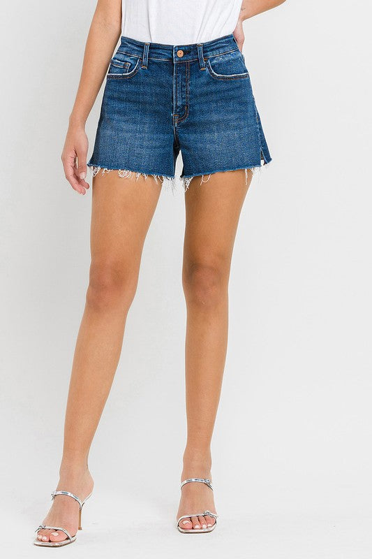 High Rise Slit Raw Hem A-Line ShortsThe High Rise Slit Raw Hem A-Line Shorts combine comfort and style effortlessly. Crafted from comfortable stretch denim, these shorts feature a high-rise waist for a