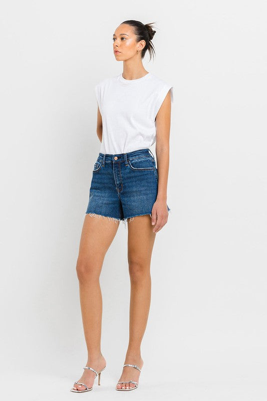 High Rise Slit Raw Hem A-Line ShortsThe High Rise Slit Raw Hem A-Line Shorts combine comfort and style effortlessly. Crafted from comfortable stretch denim, these shorts feature a high-rise waist for a