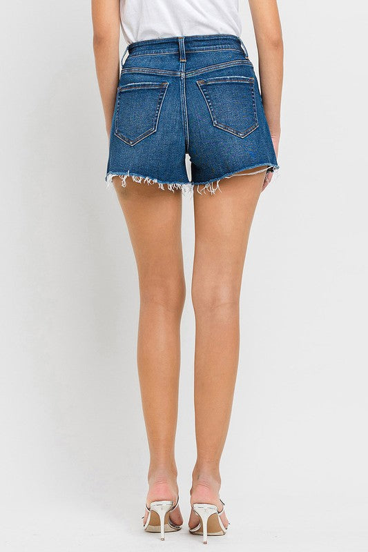 High Rise Slit Raw Hem A-Line ShortsThe High Rise Slit Raw Hem A-Line Shorts combine comfort and style effortlessly. Crafted from comfortable stretch denim, these shorts feature a high-rise waist for a