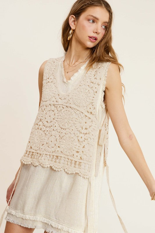 Self Side Tie Detailed Crochet Vest TopStay effortlessly stylish and cool with the Self Side Tie Detailed Crochet Vest Top. This chic addition to your wardrobe features a sleeveless silhouette and a flatt