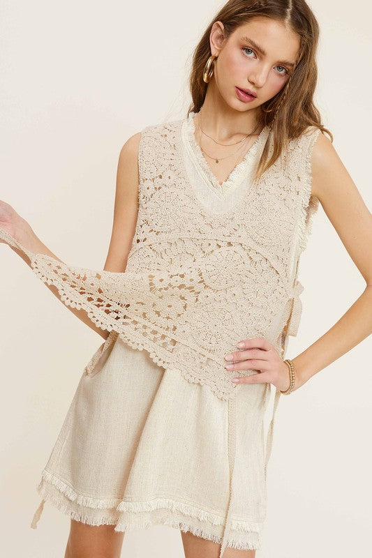 Self Side Tie Detailed Crochet Vest TopStay effortlessly stylish and cool with the Self Side Tie Detailed Crochet Vest Top. This chic addition to your wardrobe features a sleeveless silhouette and a flatt