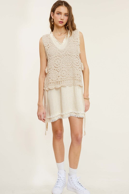 Self Side Tie Detailed Crochet Vest TopStay effortlessly stylish and cool with the Self Side Tie Detailed Crochet Vest Top. This chic addition to your wardrobe features a sleeveless silhouette and a flatt