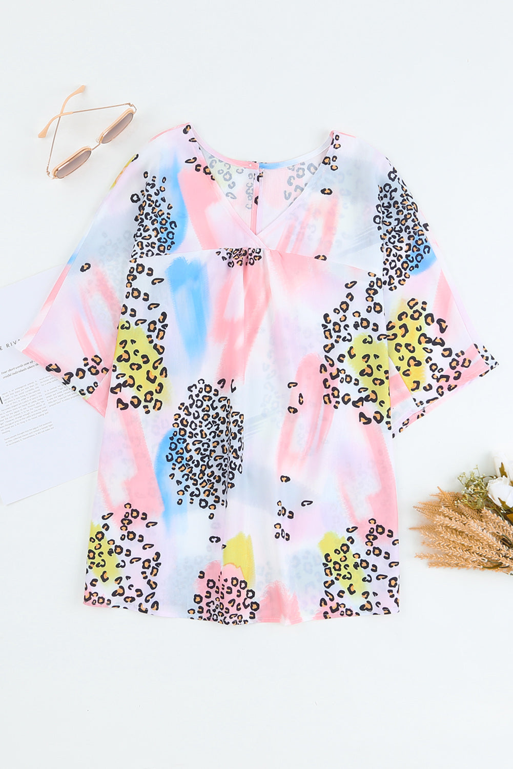 White Tie Dye Leopard Print Back Keyhole BlouseMaterial:95%POLYESTER+5%ELASTANE



		•Freshen your favorite separates with this stylish look from shewin, a vibrant top accented with flutter sleeves.
	
	
		•H