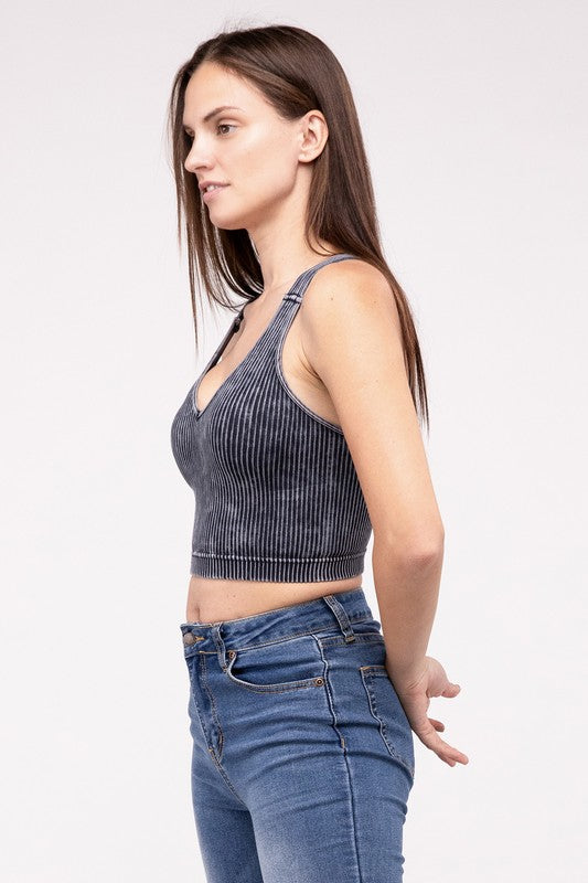 Washed Ribbed Cropped V-Neck Tank TopThe Washed Ribbed Cropped V-Neck Tank Top offers a stylish and comfortable option for your wardrobe. Made from ribbed fabric with a washed finish, it exudes a casual