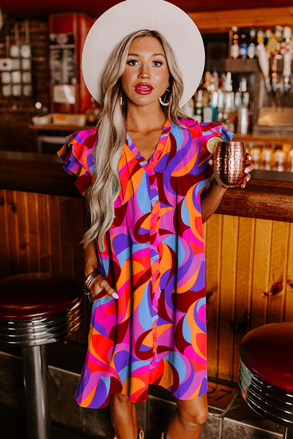 Orange Abstract Print Ruffle Sleeve Frill Trim Pocketed Mini DressMaterial:100%Polyester

• Effortlessly chic, the mini dress combines a vibrant orange hue with a trendy abstract print, perfect for a casual yet stylish look. 
• F