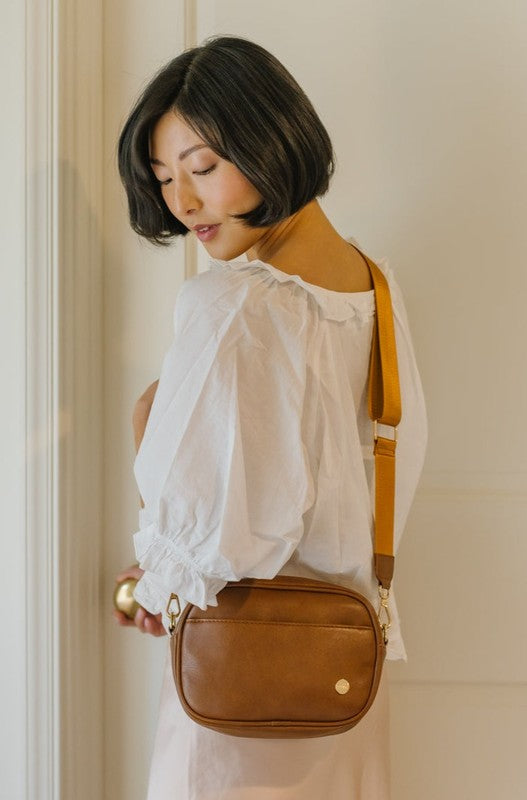 Frankie Crossbody Waist Belt Shoulder BagLightweight? Check. Durable? Check. Versatile? Biiig check.With its multi-wear options and adjustable strap, this convertible bag is the epitome of essential. Style 