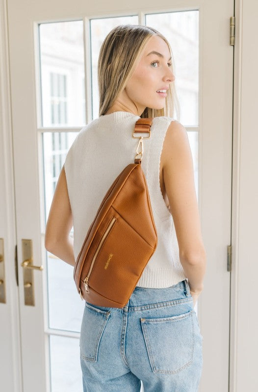 PRESLEY OVERSIZED SLING HOBO CROSSBODY BAGA true essential, the Presley is everything you need in a purse.This sling bag features: Two exterior pockets, each great for keeping your phone handy! Double zipper